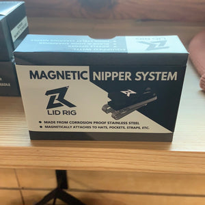 Lid rig magnetic nipper system